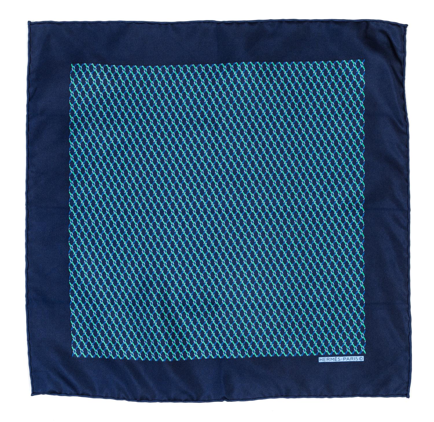 An Hermes Navy Silk Pocket Square, 17" x 17".