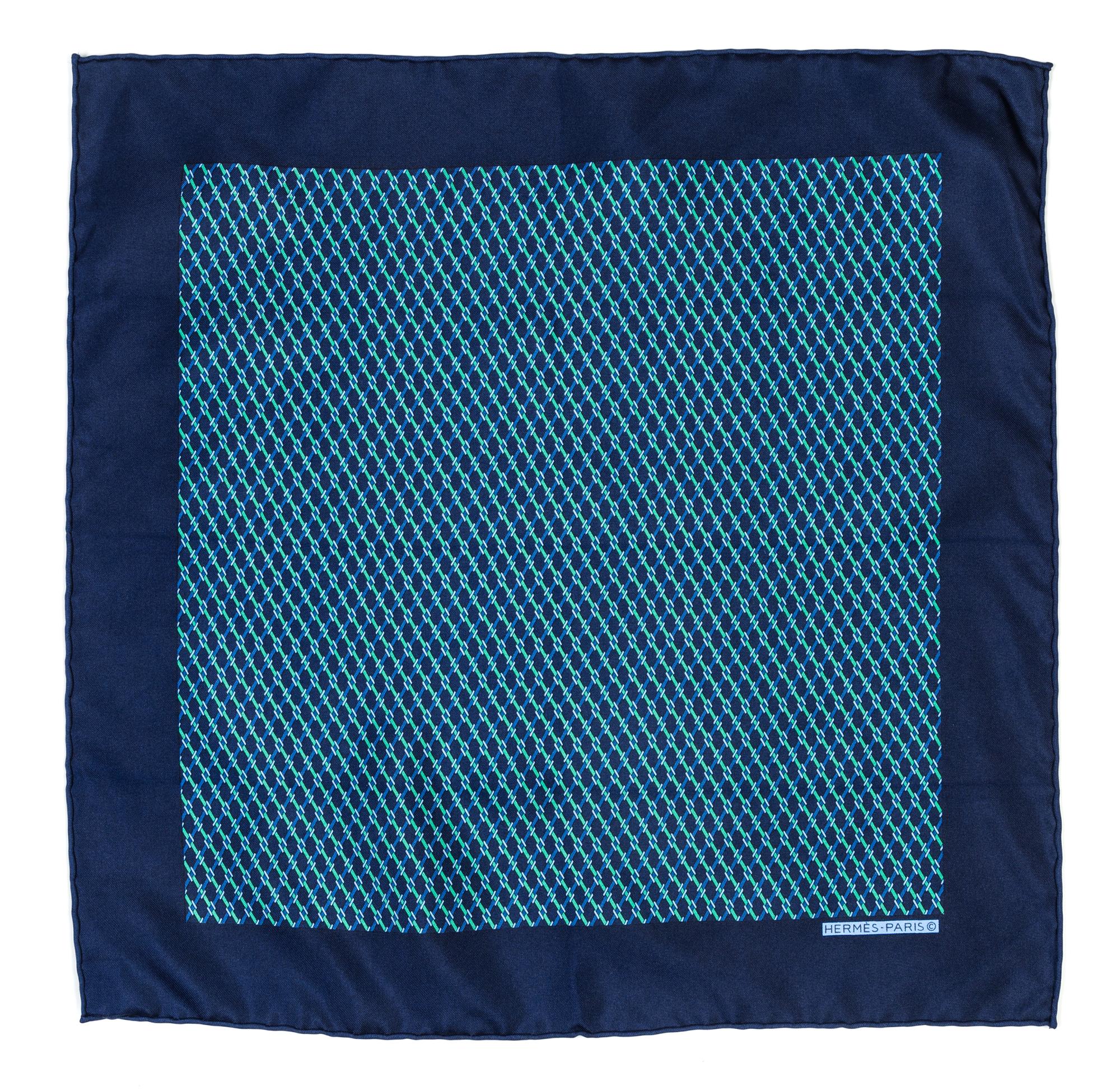 An Hermes Navy Silk Pocket Square, 17" x 17".