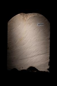 An Egyptian-Style Limestone Round-Topped Stele