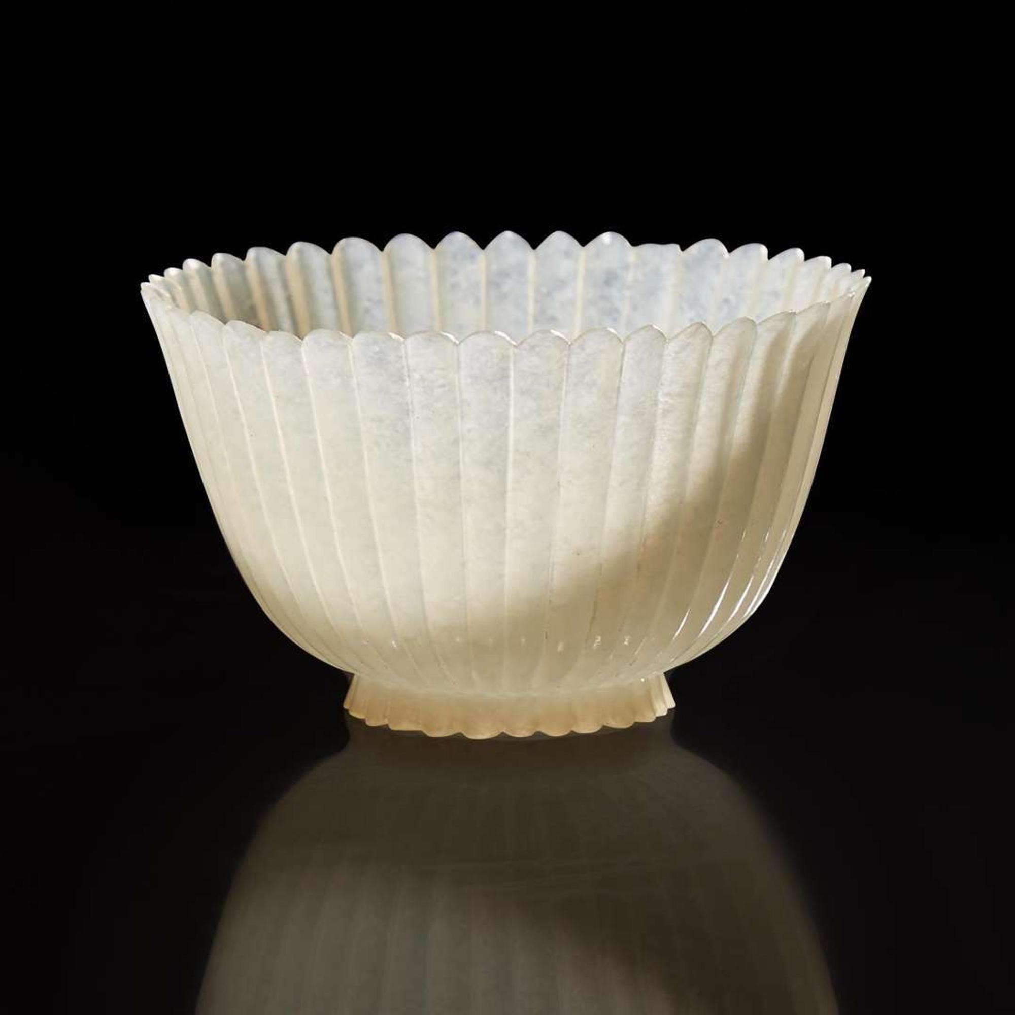 A Chinese carved white jade "Chrysanthemum" cup 玉雕薄胎菊花杯 Mid to late Qing dynasty ????