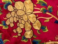 An Impressively Large Chinese Burgundy Ground Embroidered Silk 'Birthday' Wall Panel, Dated 1868 清同治七年（1868） 絳紅緞綉賀壽圖大挂屏