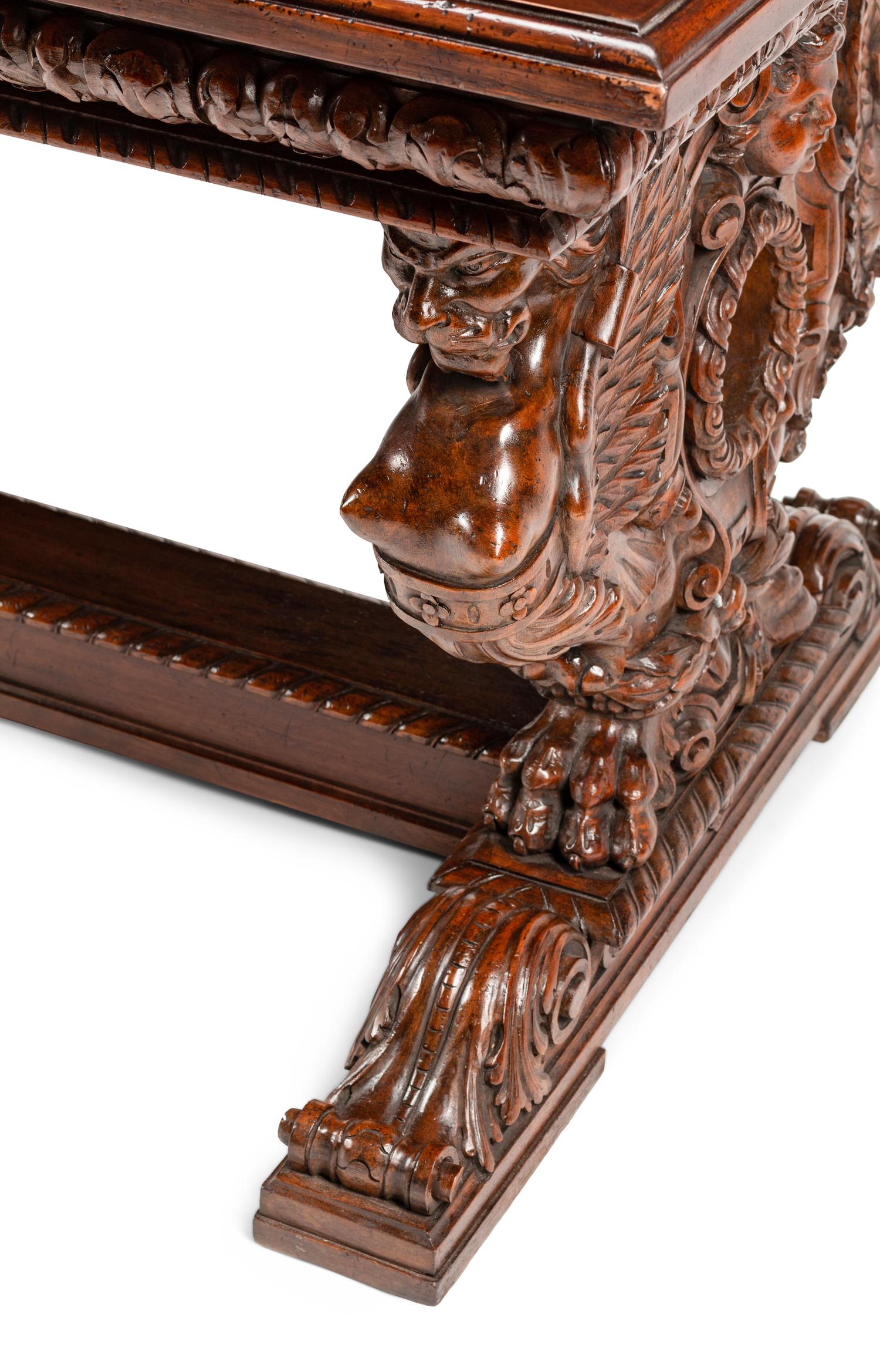 A Renaissance Revival Carved Walnut Library Table
