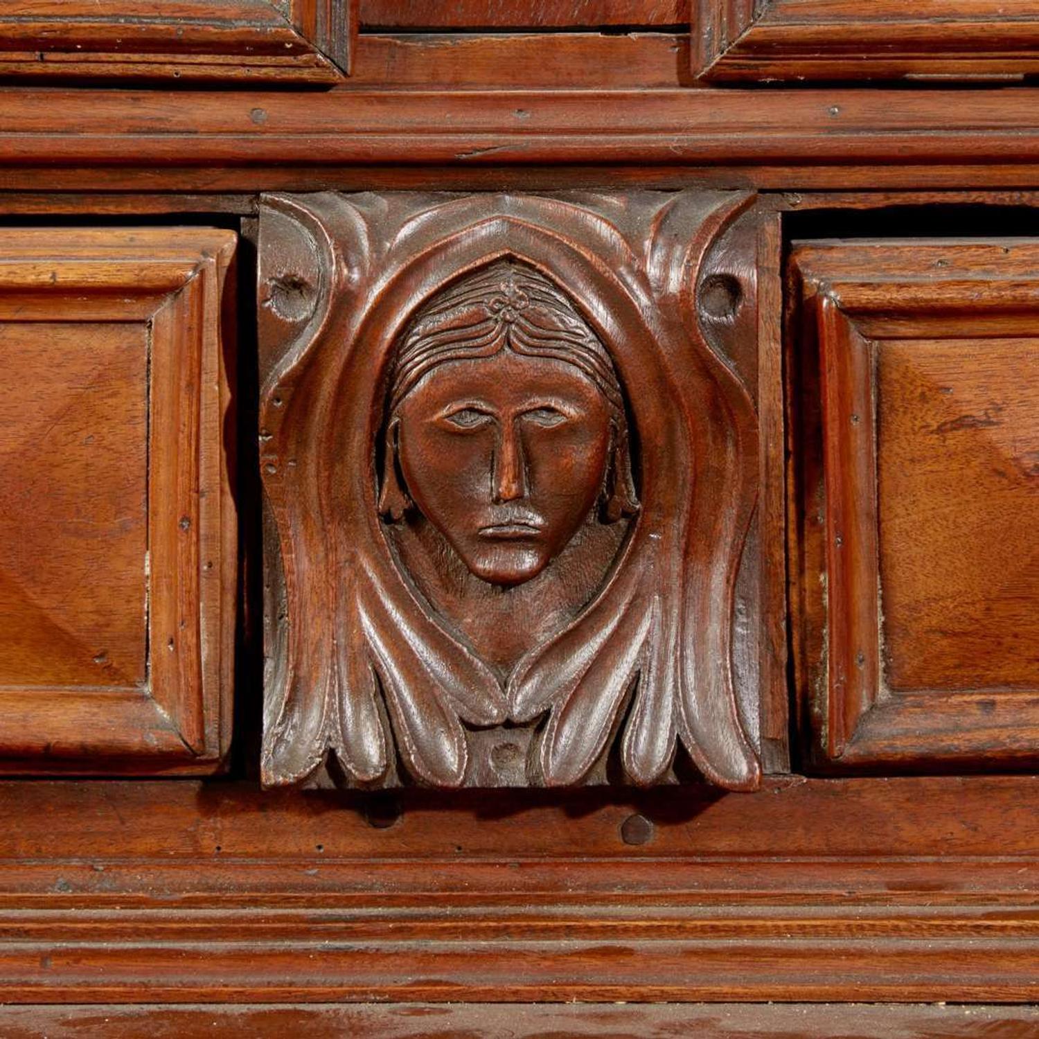 A Louis XIV walnut step-back cupboard, 17th century with later modifications