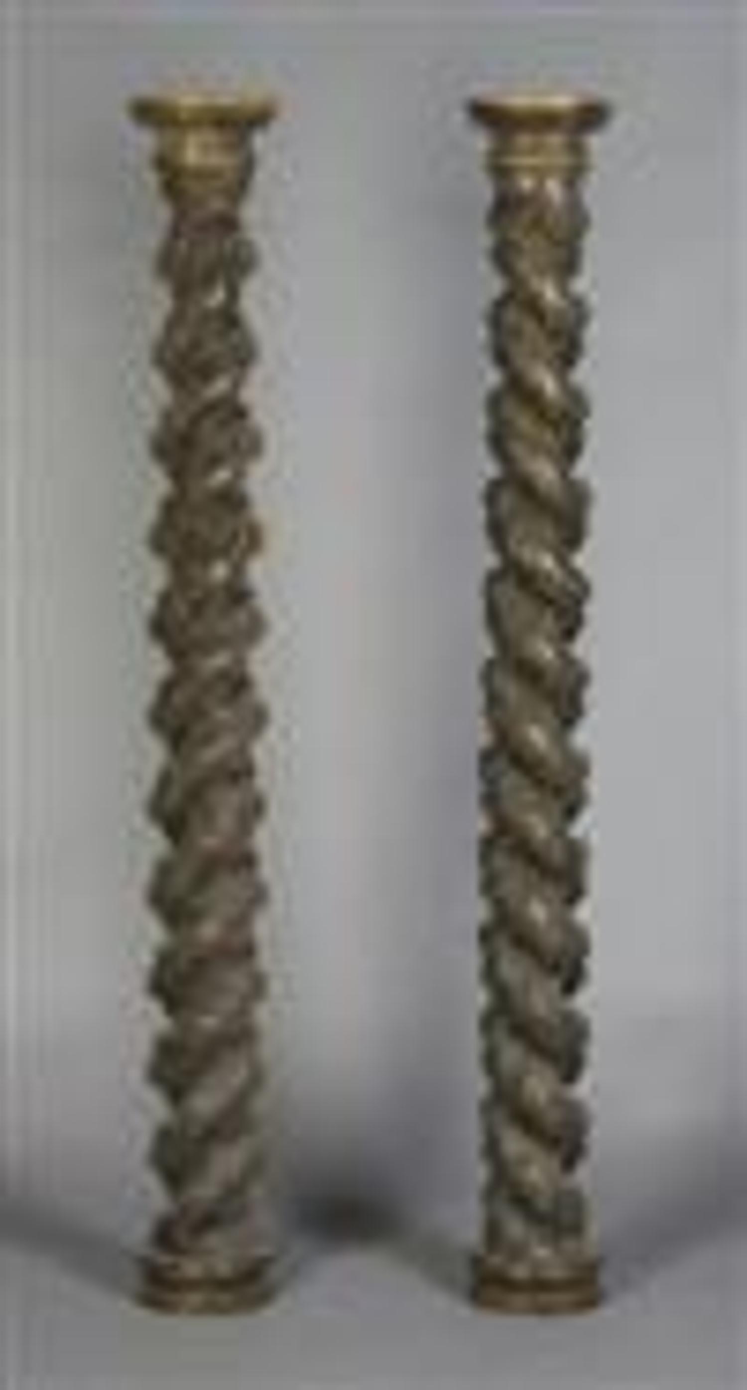 A Pair of Carved Solomonic Columns, Height 65 1/4 inches.