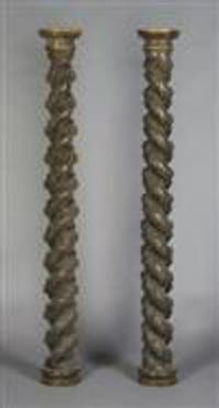 A Pair of Carved Solomonic Columns, Height 65 1/4 inches.