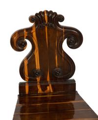 A Pair of Regency Style Calamander Hall Chairs