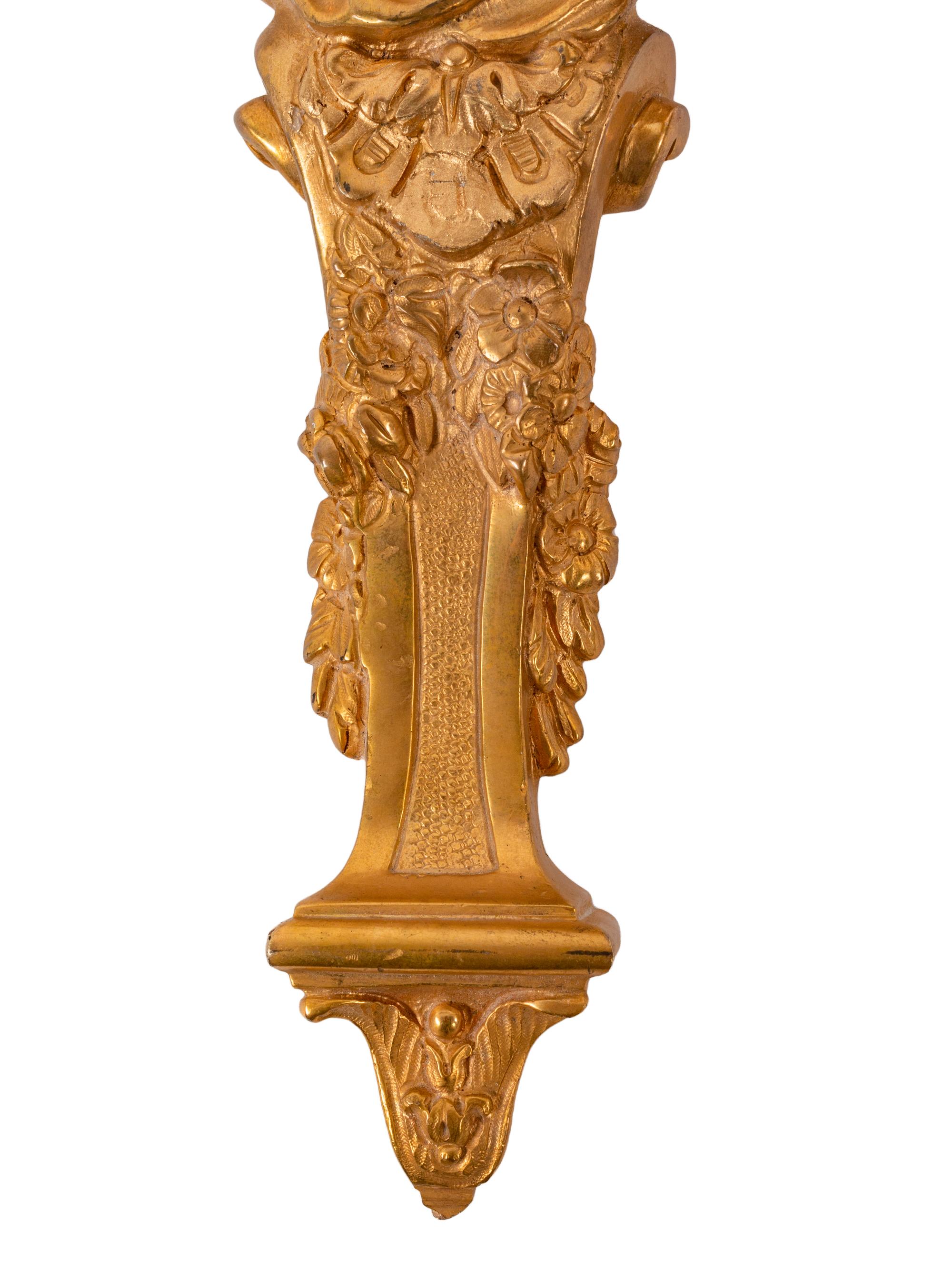 A Pair of Louis XV Style Gilt Bronze Figural Two-Light Sconces