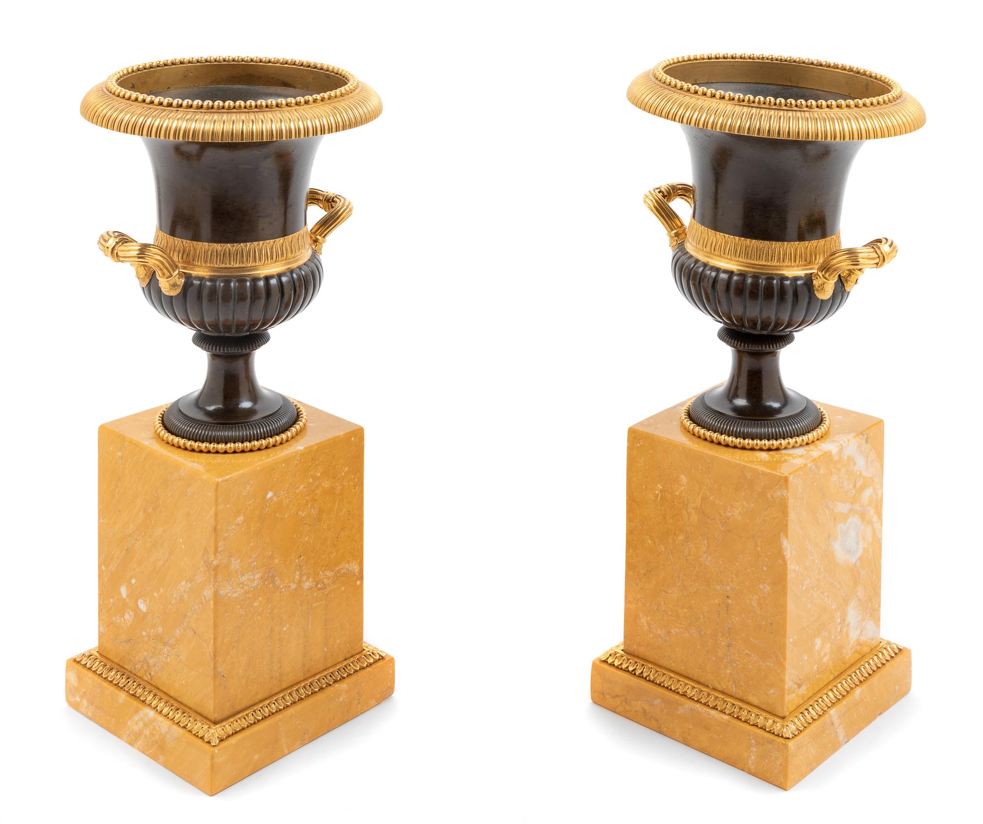 A Pair of Gilt, Patinated Bronze and Marble Campagna Urn Ornaments Height 11 1/2 x diameter 5 1/2 inches. — LATE 19TH CENTURY