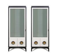 A Pair of Powell and Bonnell Black and White Lacquered Vitrine Cabinets