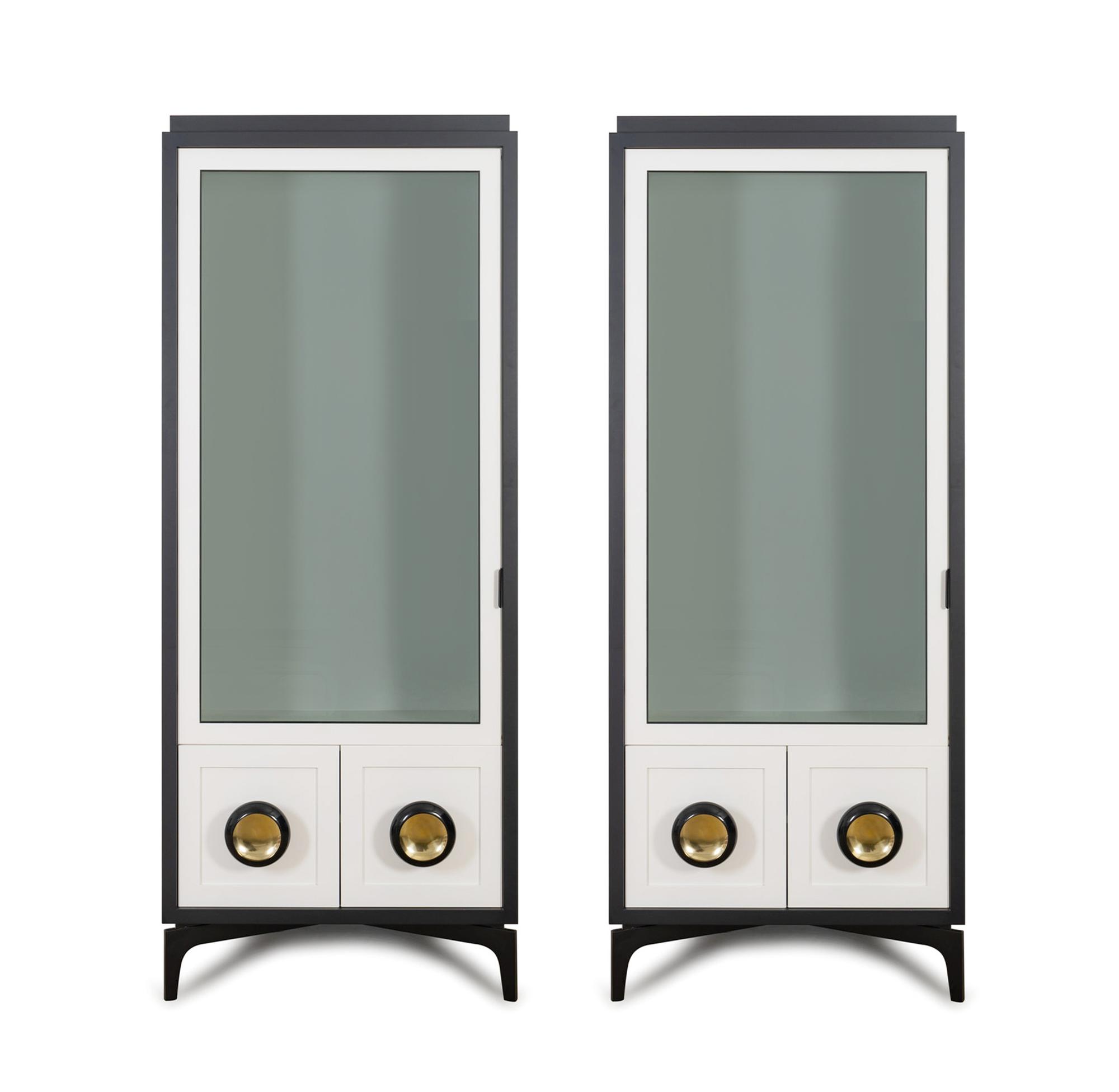 A Pair of Powell and Bonnell Black and White Lacquered Vitrine Cabinets