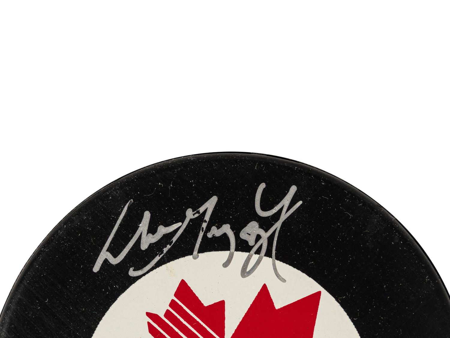 A Wayne Gretzky Signed Autograph Canada Hockey Puck (Beckett Authentication Services Letter BAS Certified),