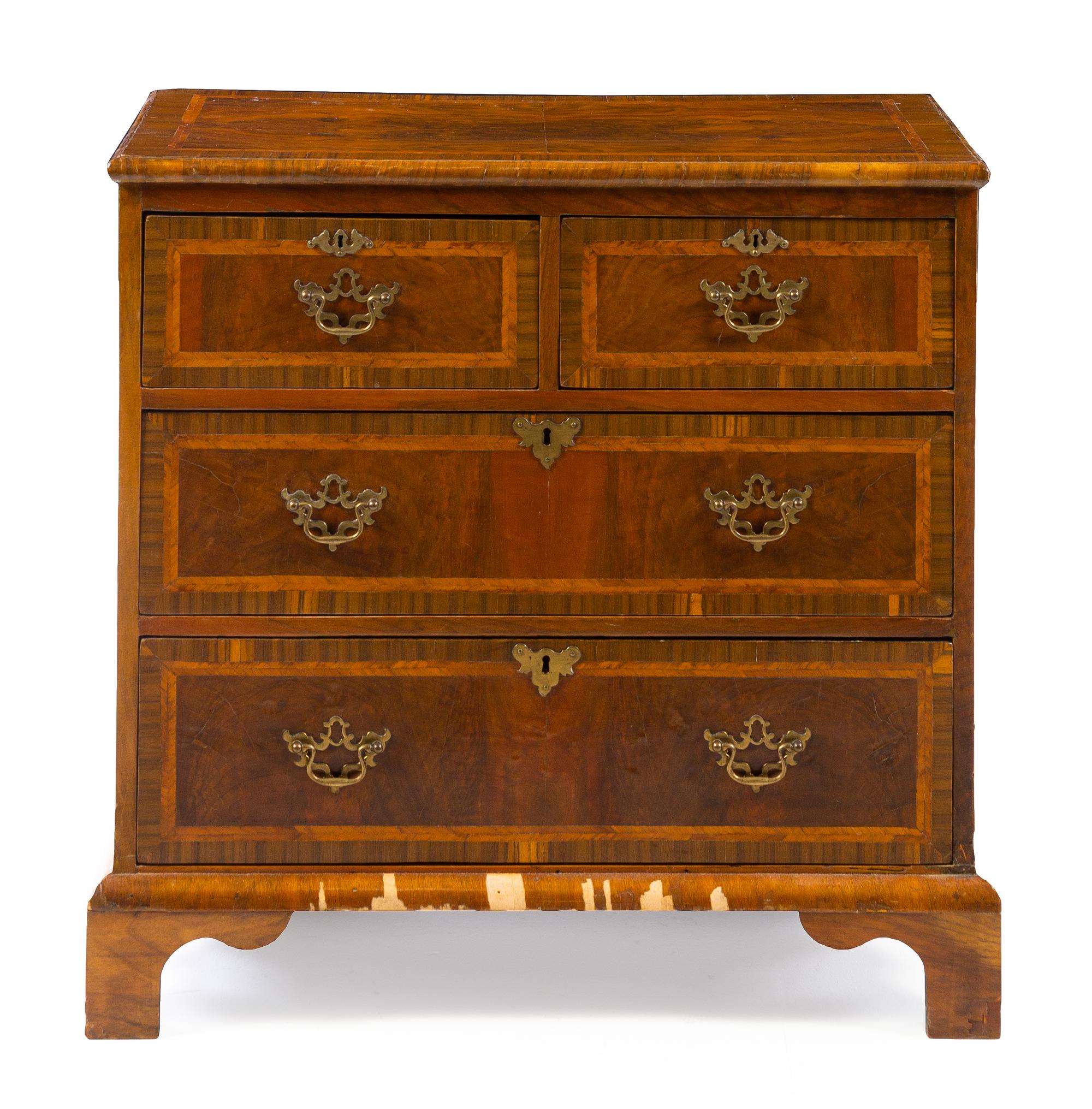 A George III Burl Walnut Chest of Drawers Height 31 x width 31 1/4 x depth 16 3/4 inches. — LATE 18TH/EARLY 19TH CENTURY
