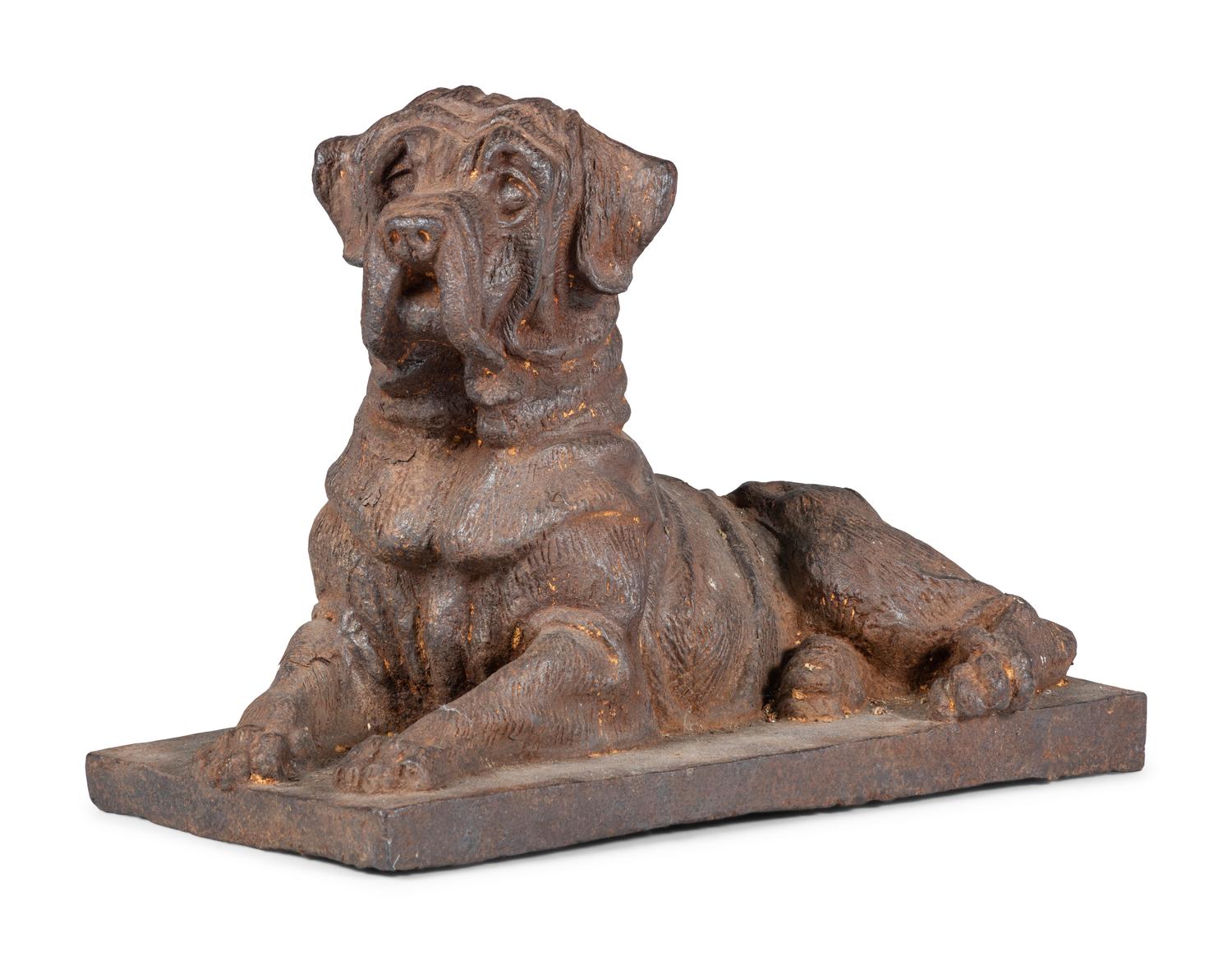 A Cast Iron Reclining Mastiff