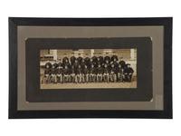 [BUFFALO SOLDIERS]. A group of 2 photographs of members of the 9th Cavalry, incl. Charles Young and George Prioleau. Fort D.A. Russell, Cheyenne, Wyoming, ca 1910s.