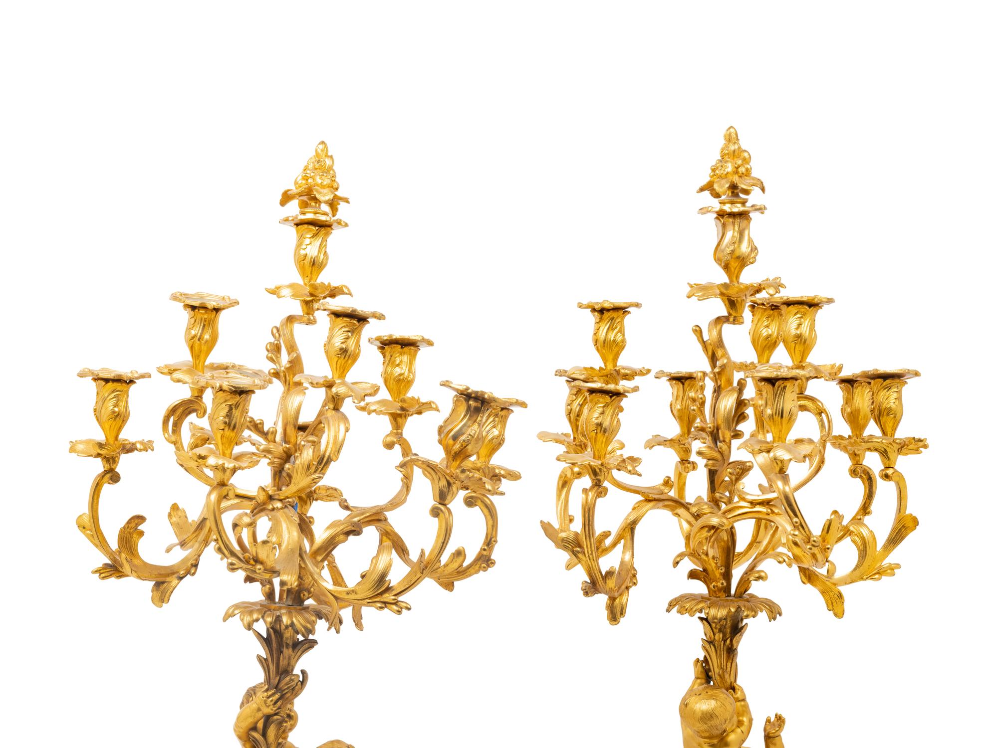A Pair of Louis XV Style Gilt Bronze Figural Ten-Light Candelabra