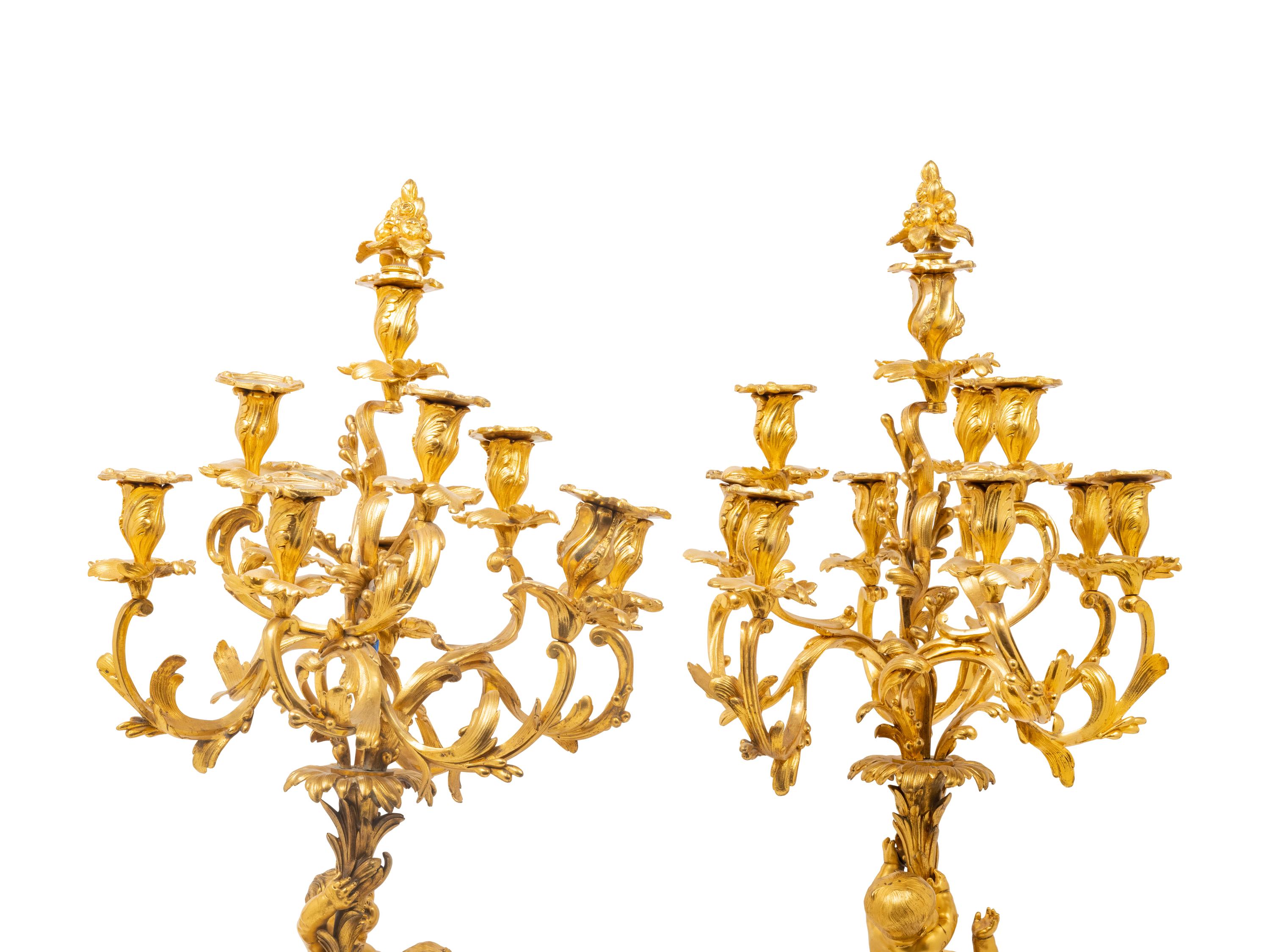 A Pair of Louis XV Style Gilt Bronze Figural Ten-Light Candelabra