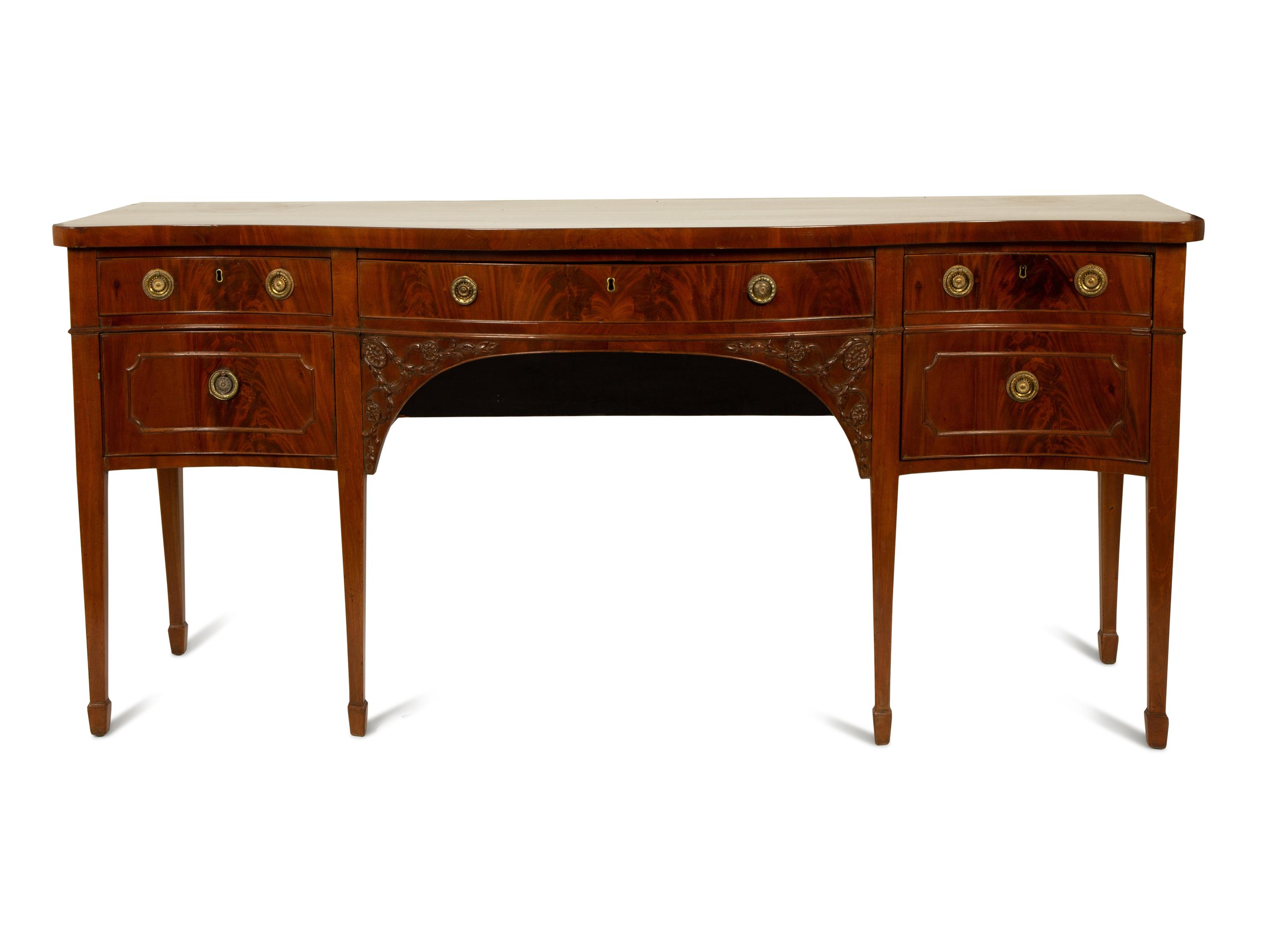 A George III Carved Mahogany Serpentine-Front Sideboard — 19TH CENTURY