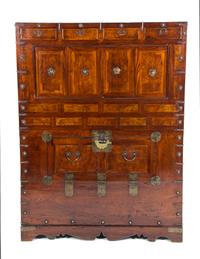 A Korean Elmwood Storage Cabinet Height 46 1/2 x width 15 1/2 x depth 34 1/2 inches. — YI DYNASTY, 19TH CENTURY