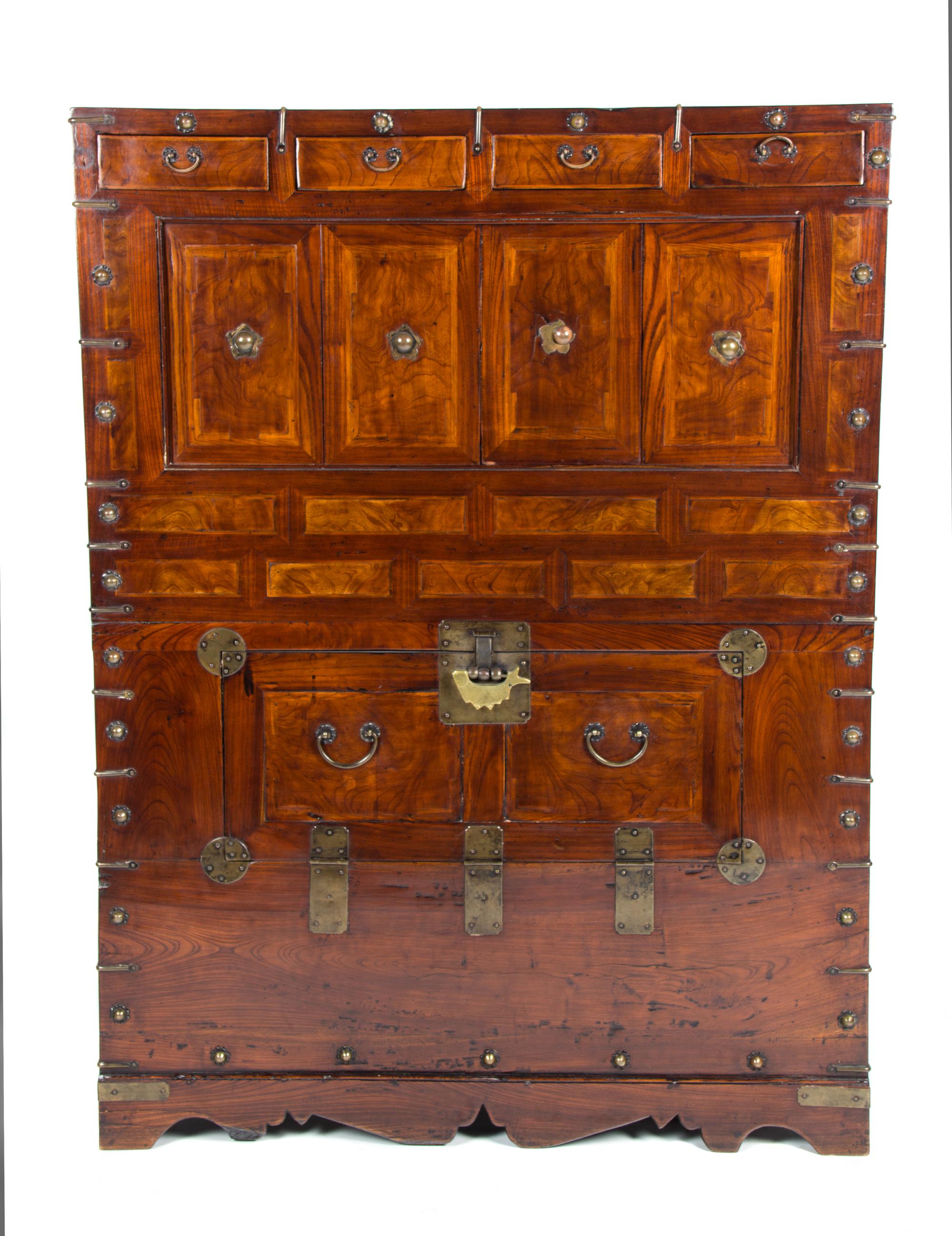 A Korean Elmwood Storage Cabinet Height 46 1/2 x width 15 1/2 x depth 34 1/2 inches. — YI DYNASTY, 19TH CENTURY