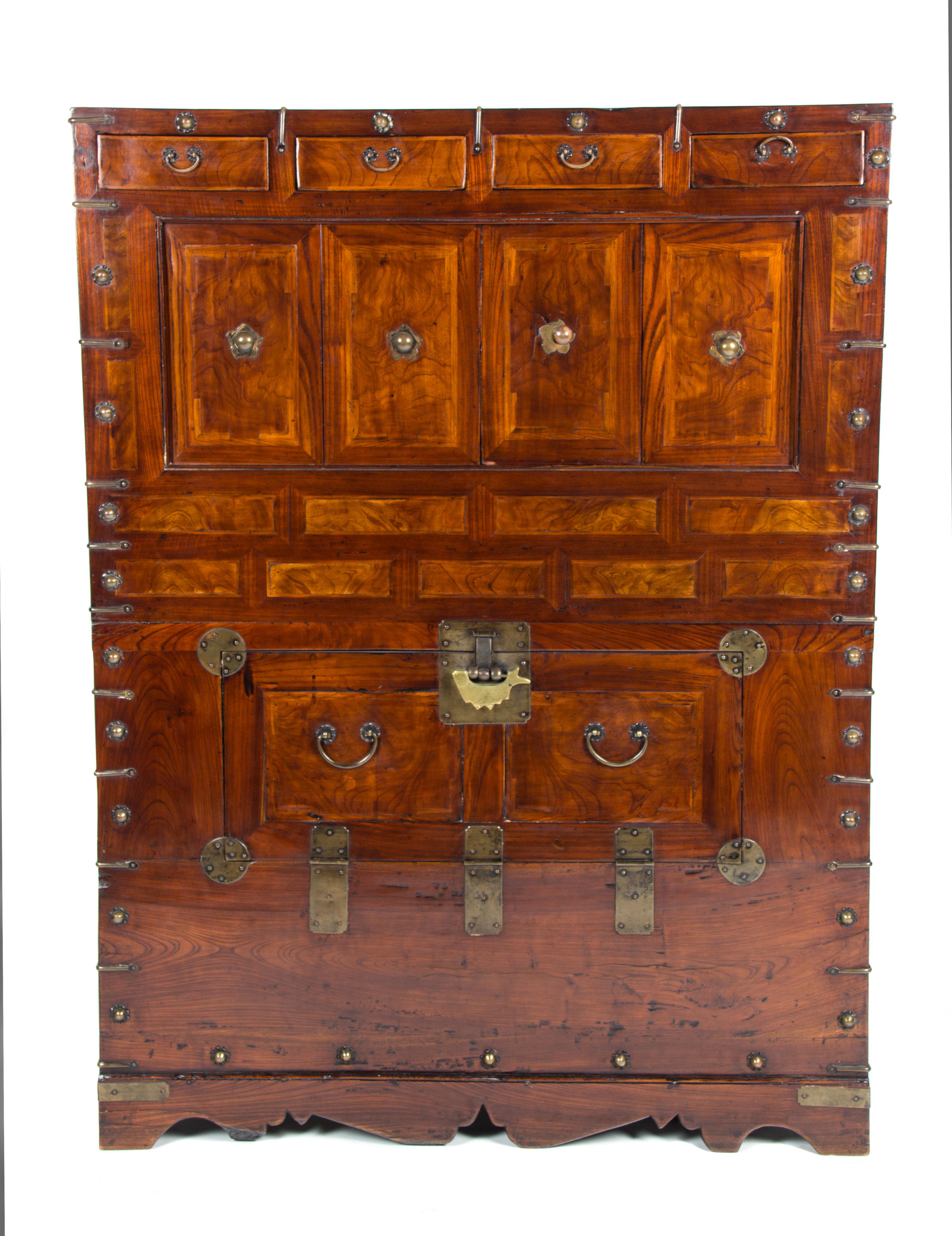 A Korean Elmwood Storage Cabinet Height 46 1/2 x width 15 1/2 x depth 34 1/2 inches. — YI DYNASTY, 19TH CENTURY