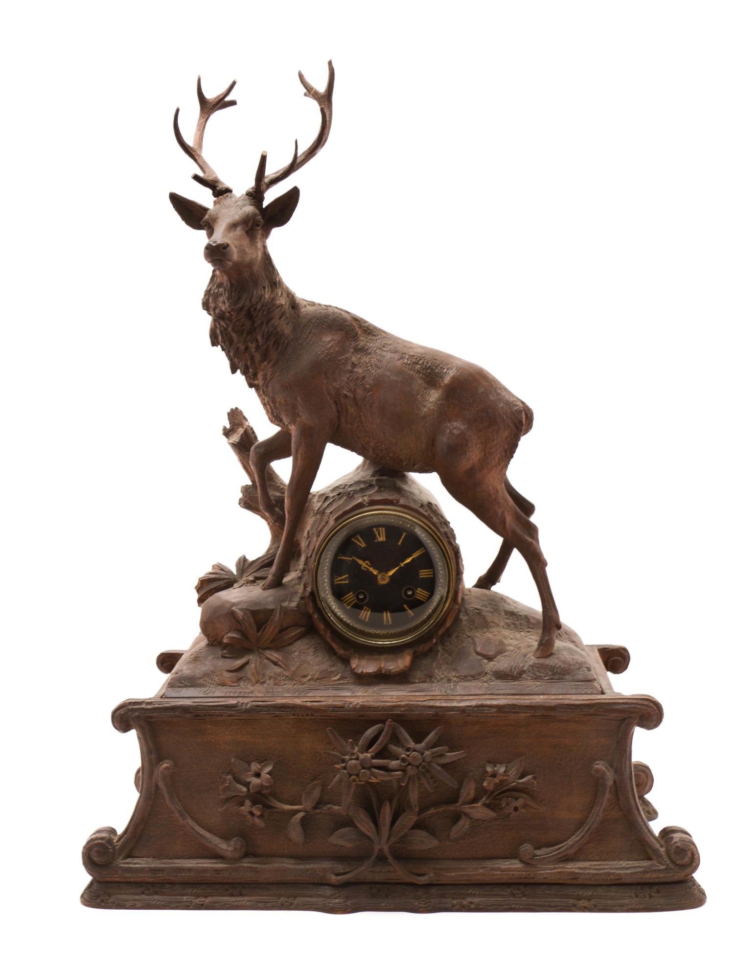 A Black Forest Walnut Musical Mantel Clock, 19TH CENTURY, MOVEMENT BY JAPY FRERES, Height 25 3/8 x width 18 1/2 x depth 7 7/8 inches. — 19TH CENTURY, MOVEMENT BY JAPY FRERES,