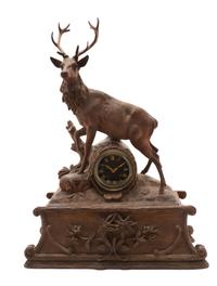 A Black Forest Walnut Musical Mantel Clock, 19TH CENTURY, MOVEMENT BY JAPY FRERES, Height 25 3/8 x width 18 1/2 x depth 7 7/8 inches. — 19TH CENTURY, MOVEMENT BY JAPY FRERES,