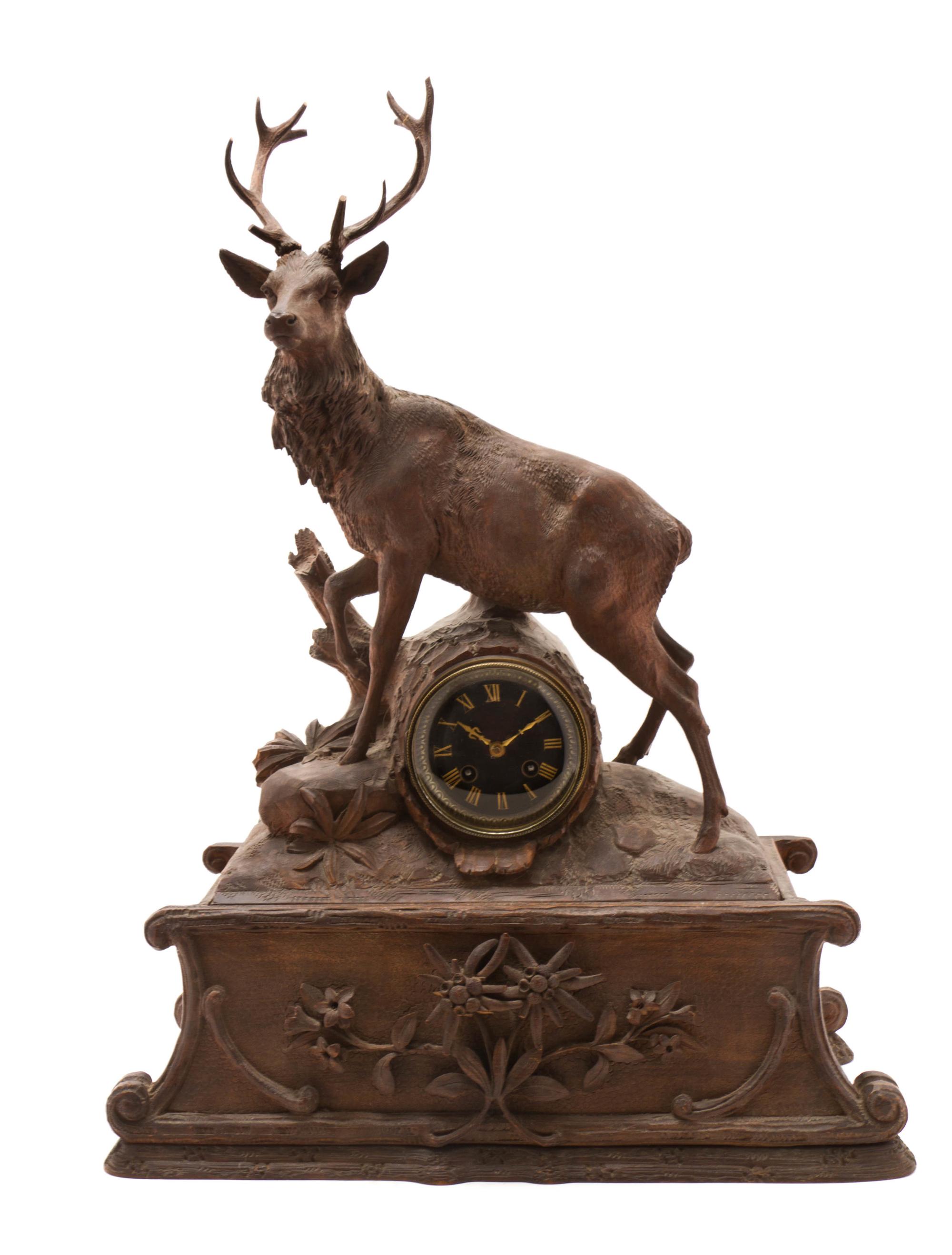 A Black Forest Walnut Musical Mantel Clock, 19TH CENTURY, MOVEMENT BY JAPY FRERES, Height 25 3/8 x width 18 1/2 x depth 7 7/8 inches. — 19TH CENTURY, MOVEMENT BY JAPY FRERES,