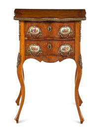 A Louis XV Style Gilt Metal and Porcelain Mounted Side Table