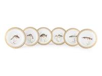 A Set of Twelve Royal Copenhagen Parcel Gilt Porcelain Fish Plates