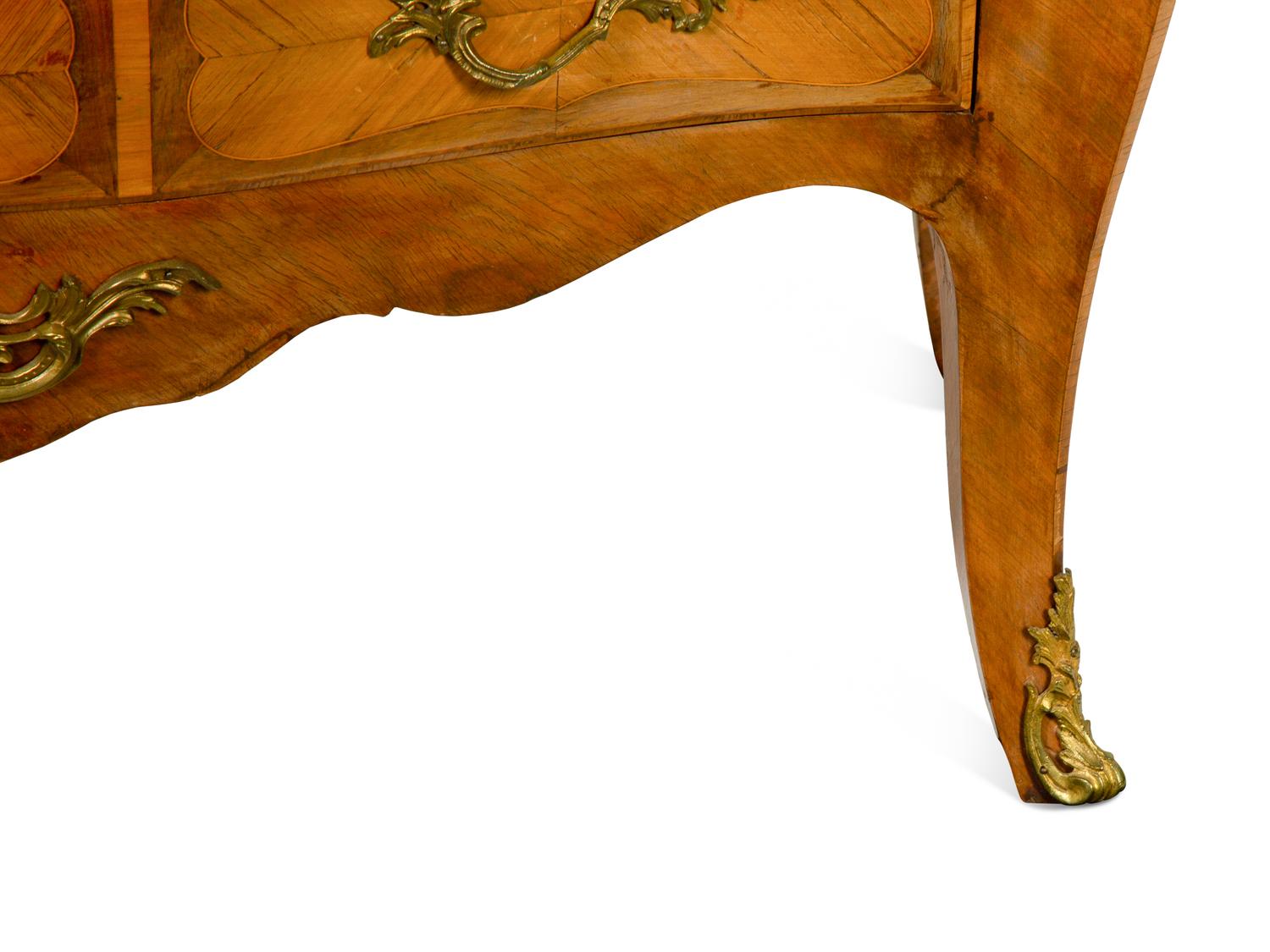 A Louis XV Style Gilt Bronze Mounted Various Woods Commode