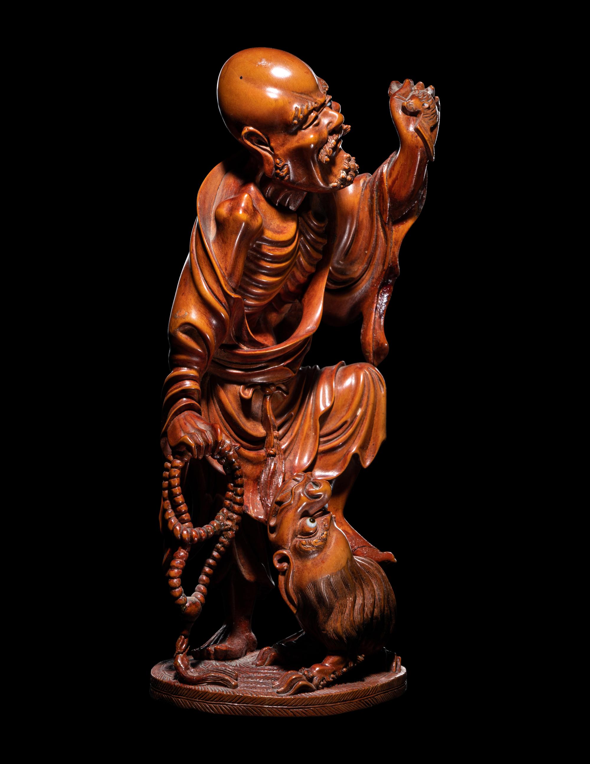 A Chinese Carved Boxwood Figure of Luohan