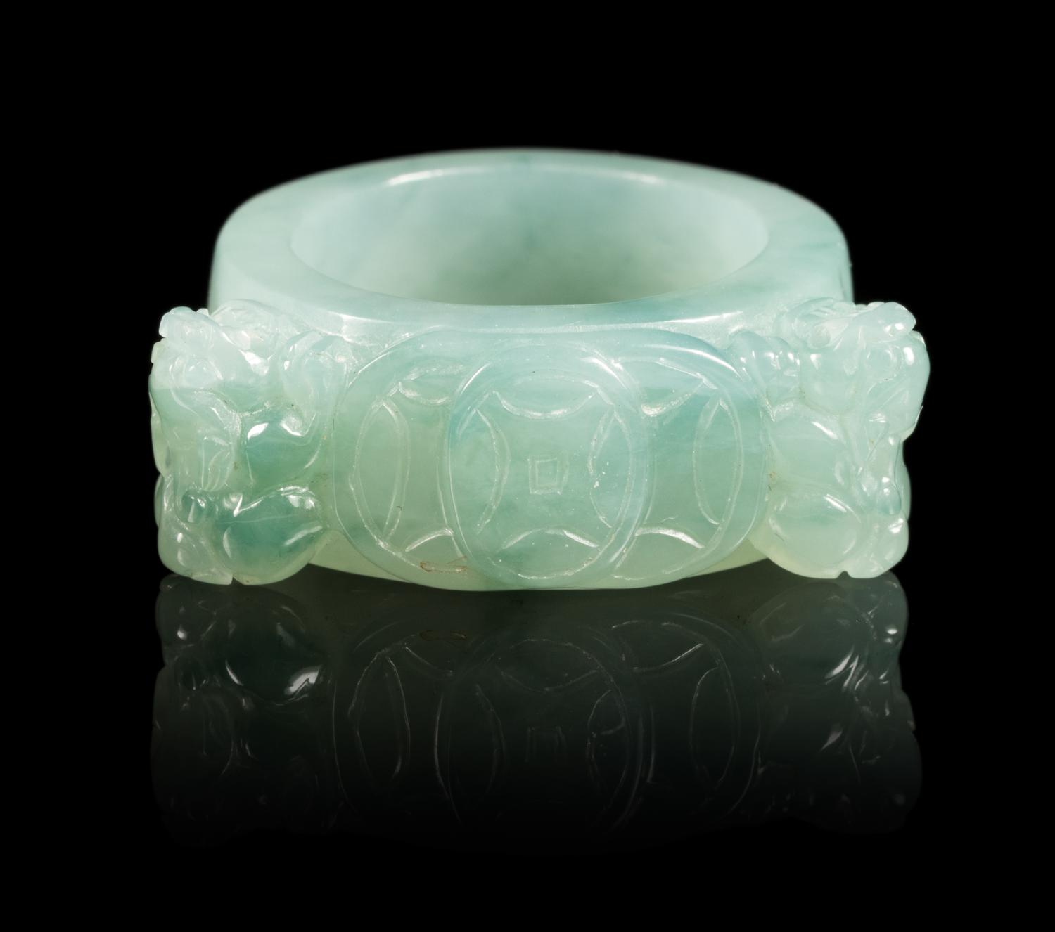 A Jadeite Ring Diameter 1 1/16 inches. — 20TH CENTURY