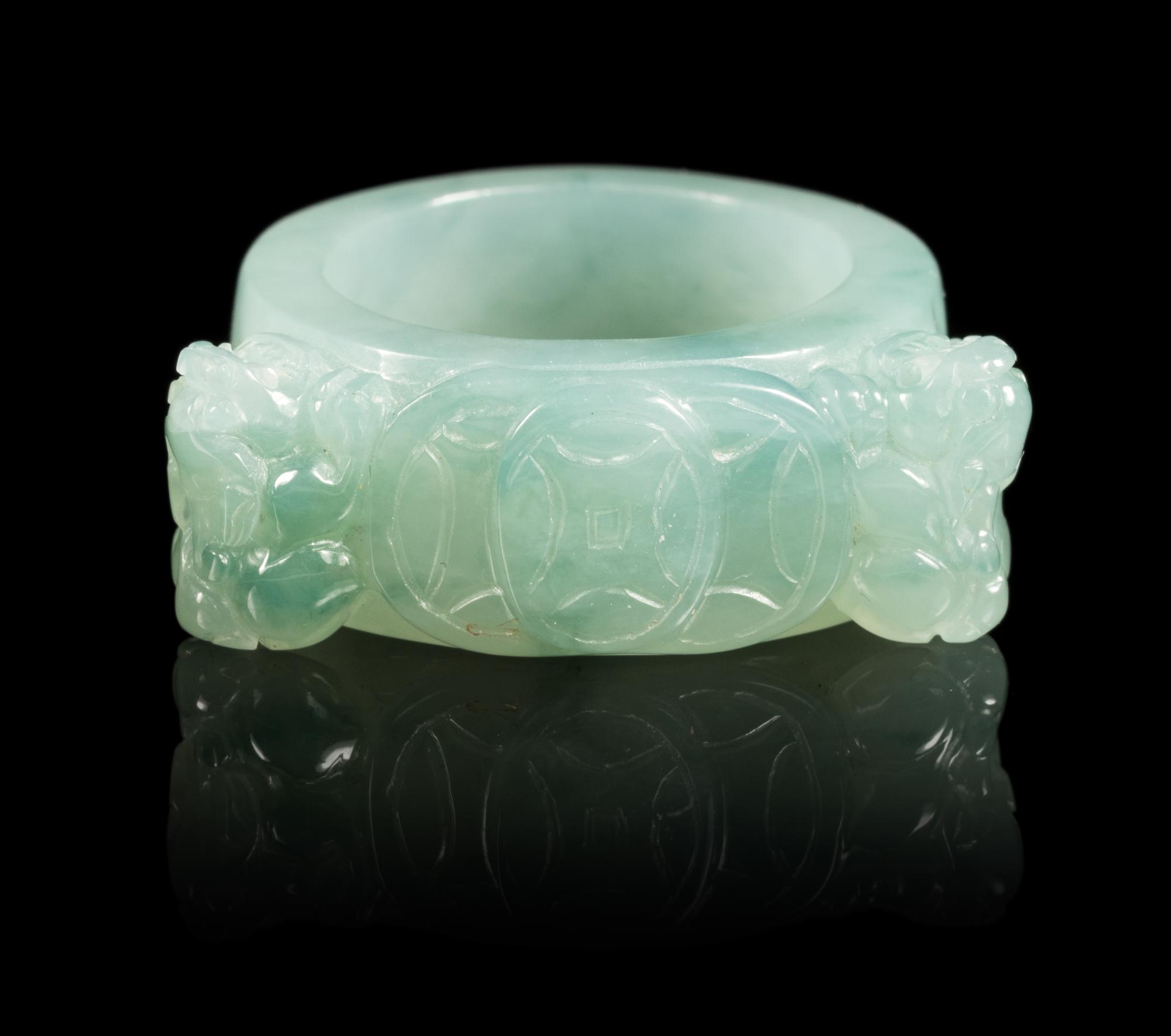 A Jadeite Ring Diameter 1 1/16 inches. — 20TH CENTURY