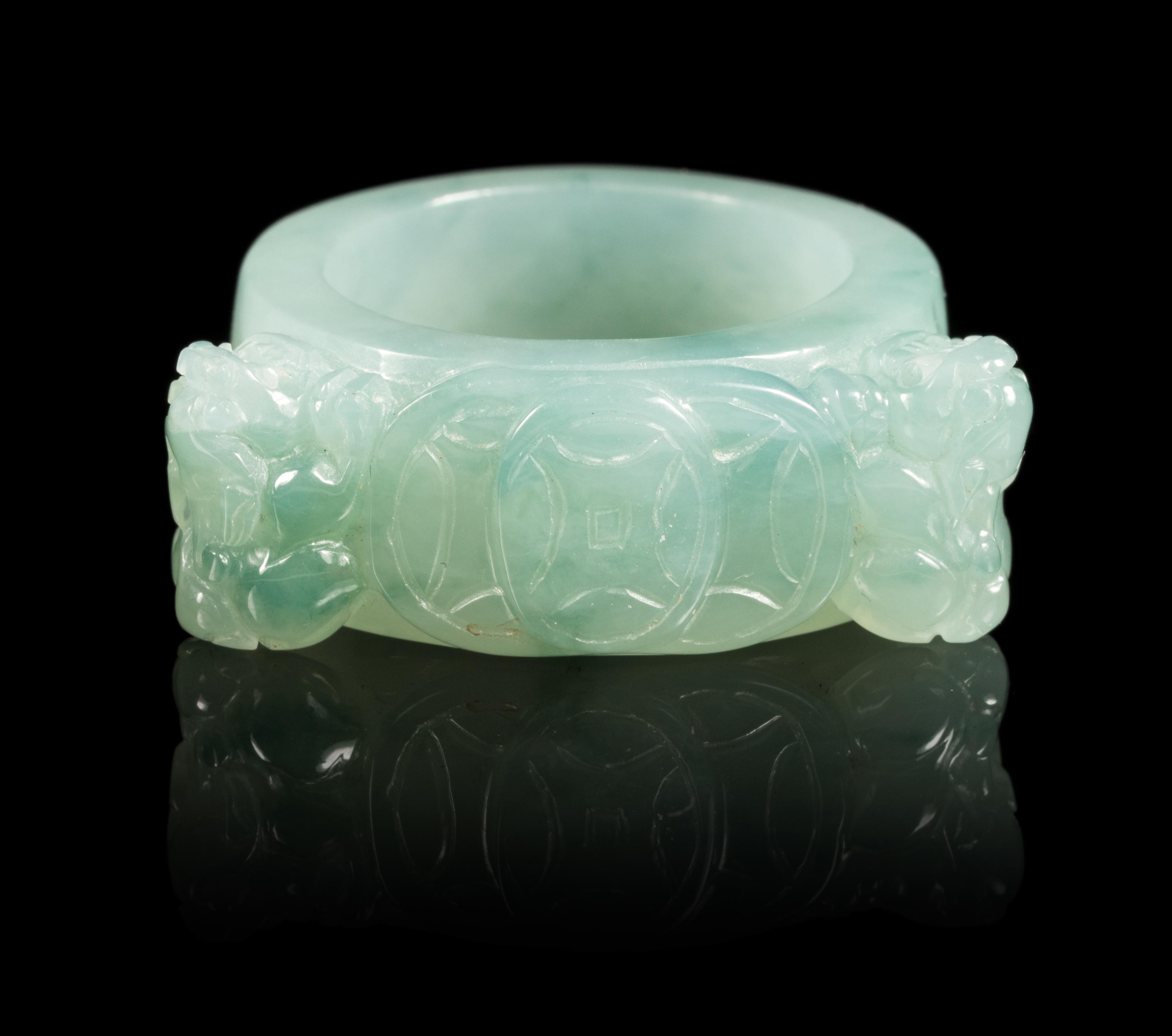 A Jadeite Ring Diameter 1 1/16 inches. — 20TH CENTURY