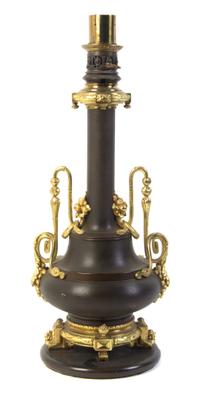 A French Gilt and Patinated Bronze Table Lamp, Height overall 37 inches.