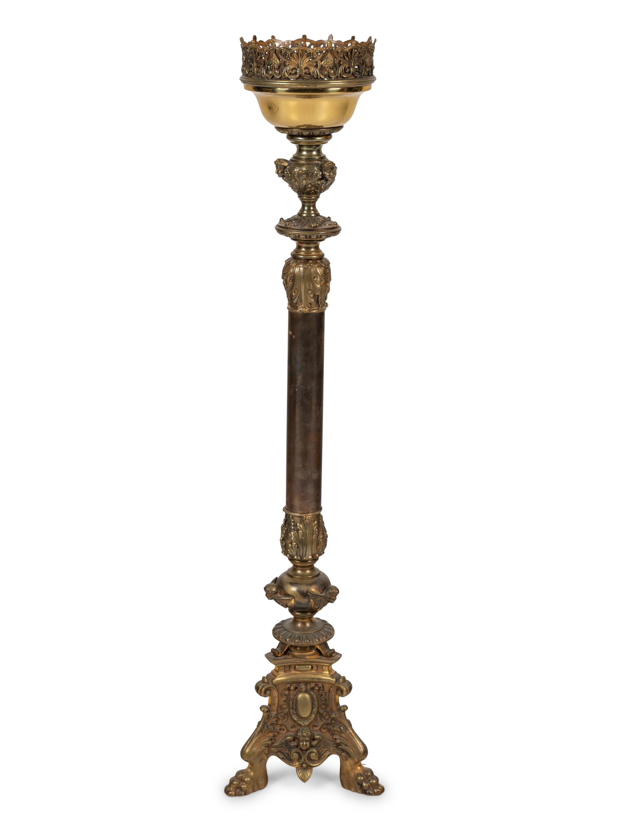 A Neoclassical Gilt Metal Pricket