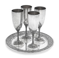 A Set of Four Asprey Silver Champagne Flutes and Tray