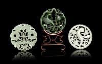 Three Chinese Reticulated Jade Pendants