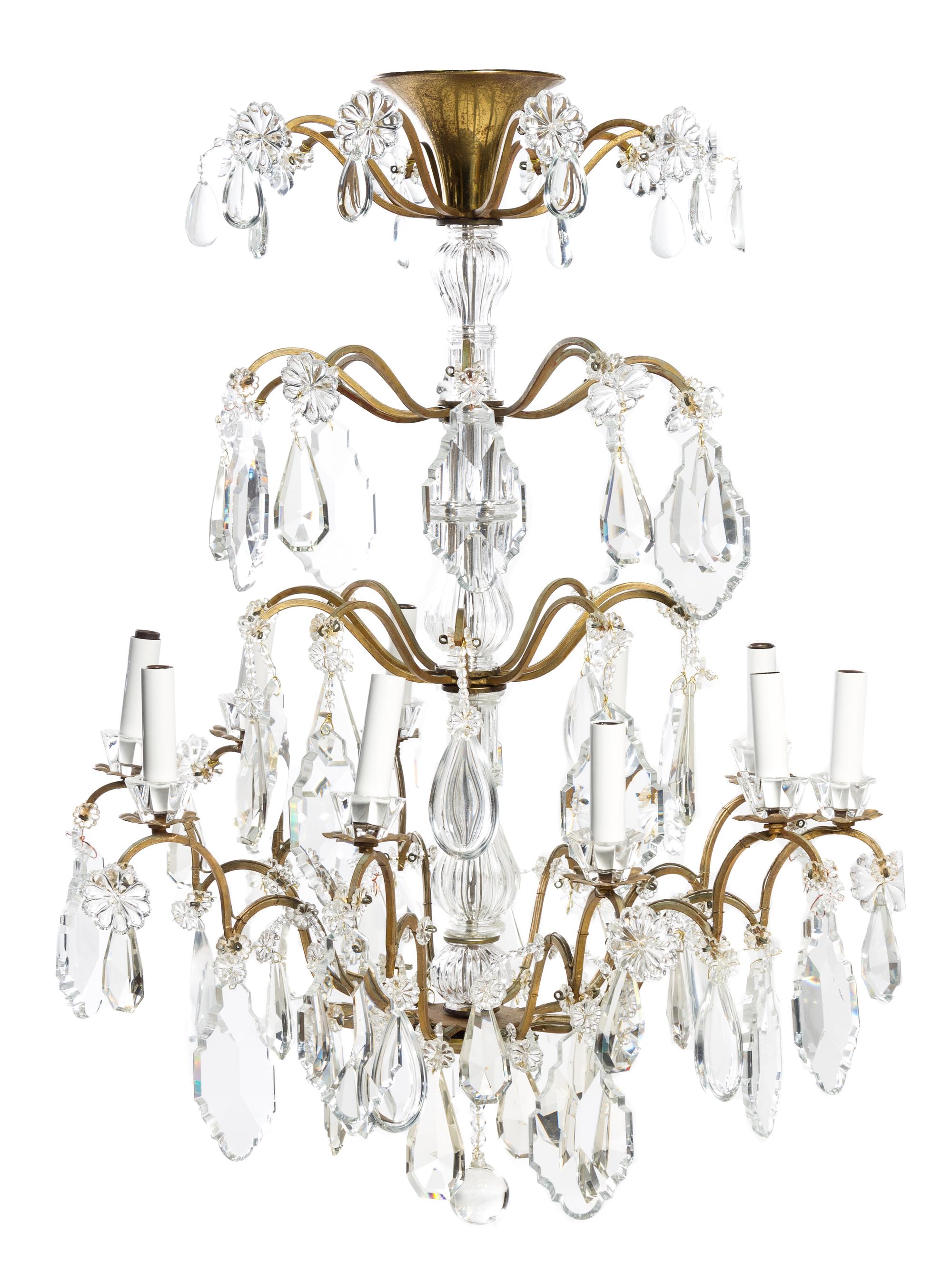 A French Brass and Glass Ten-Light Chandelier Height 33 x diameter 22 1/2 inches.