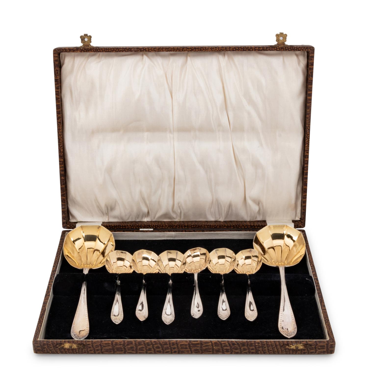 A Cased Set of Parcel Gilt SIlver-Plate Serving Spoons