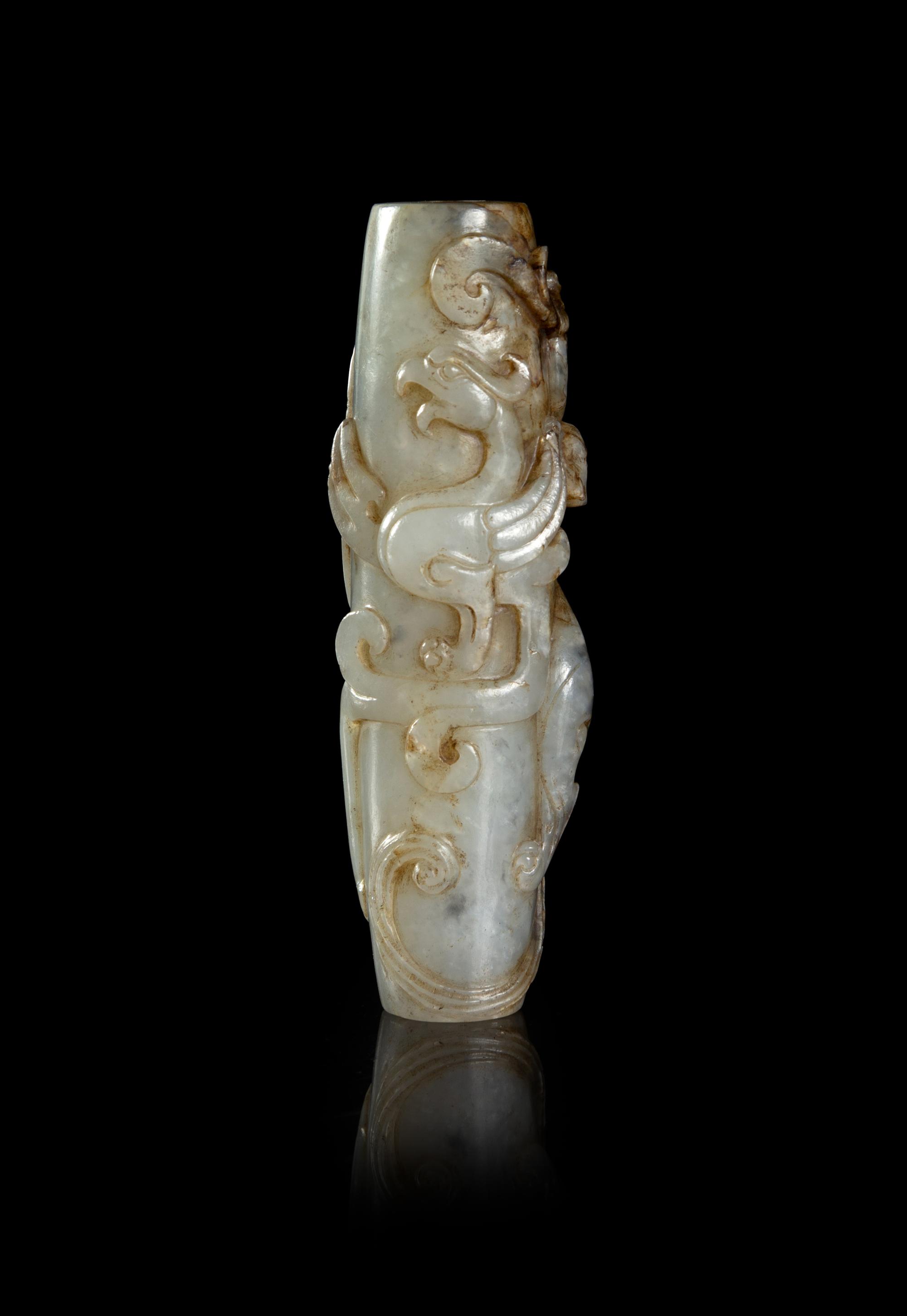 A Black and White Jade ‘Chilong’ Tubular Pendant