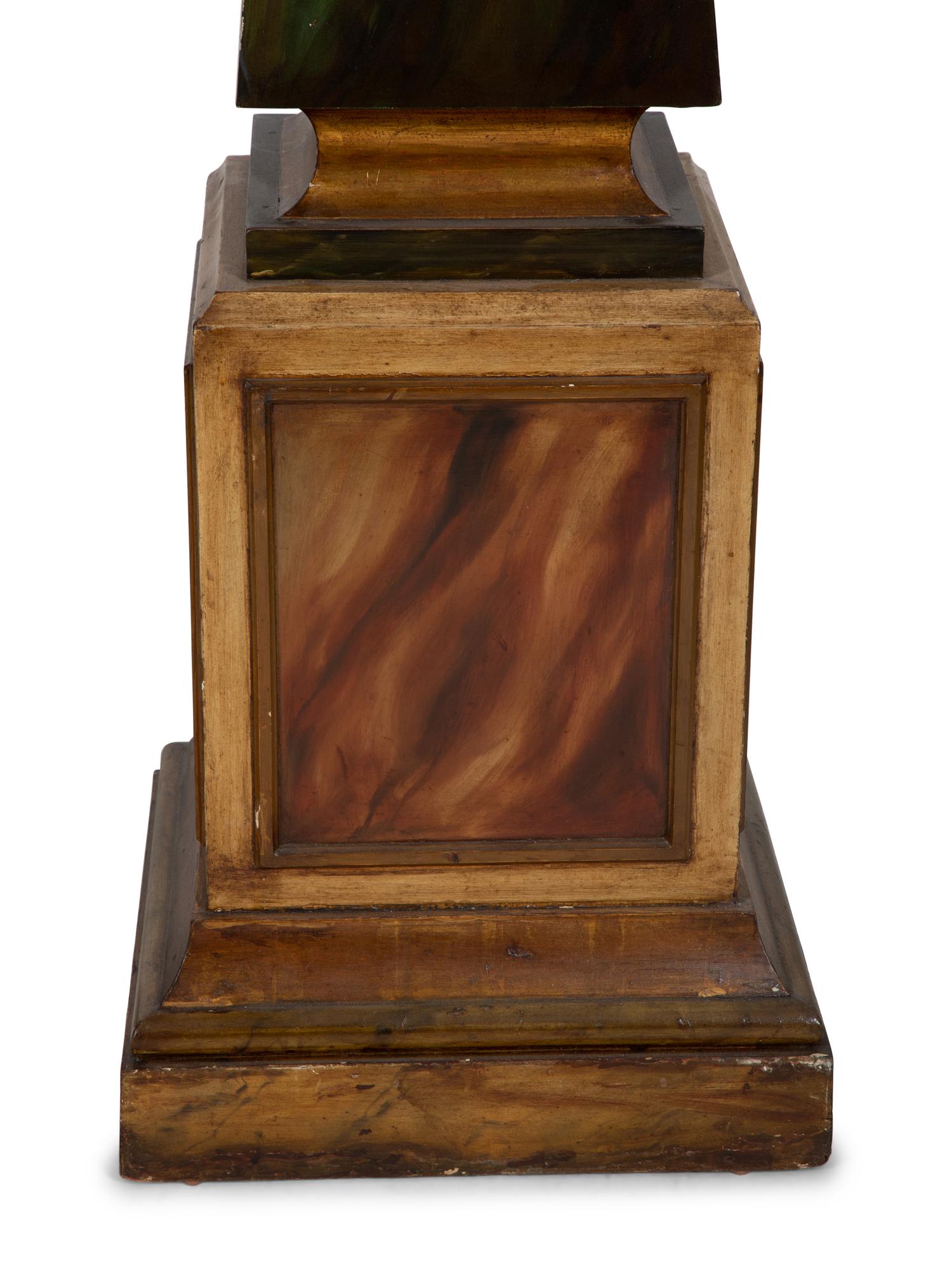 A Pair of Painted and Parcel Gilt Faux-Marble Obelisks
