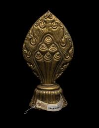 A Nepalese Repoussé Gilt Bronze Flaming Jewel Altar Piece