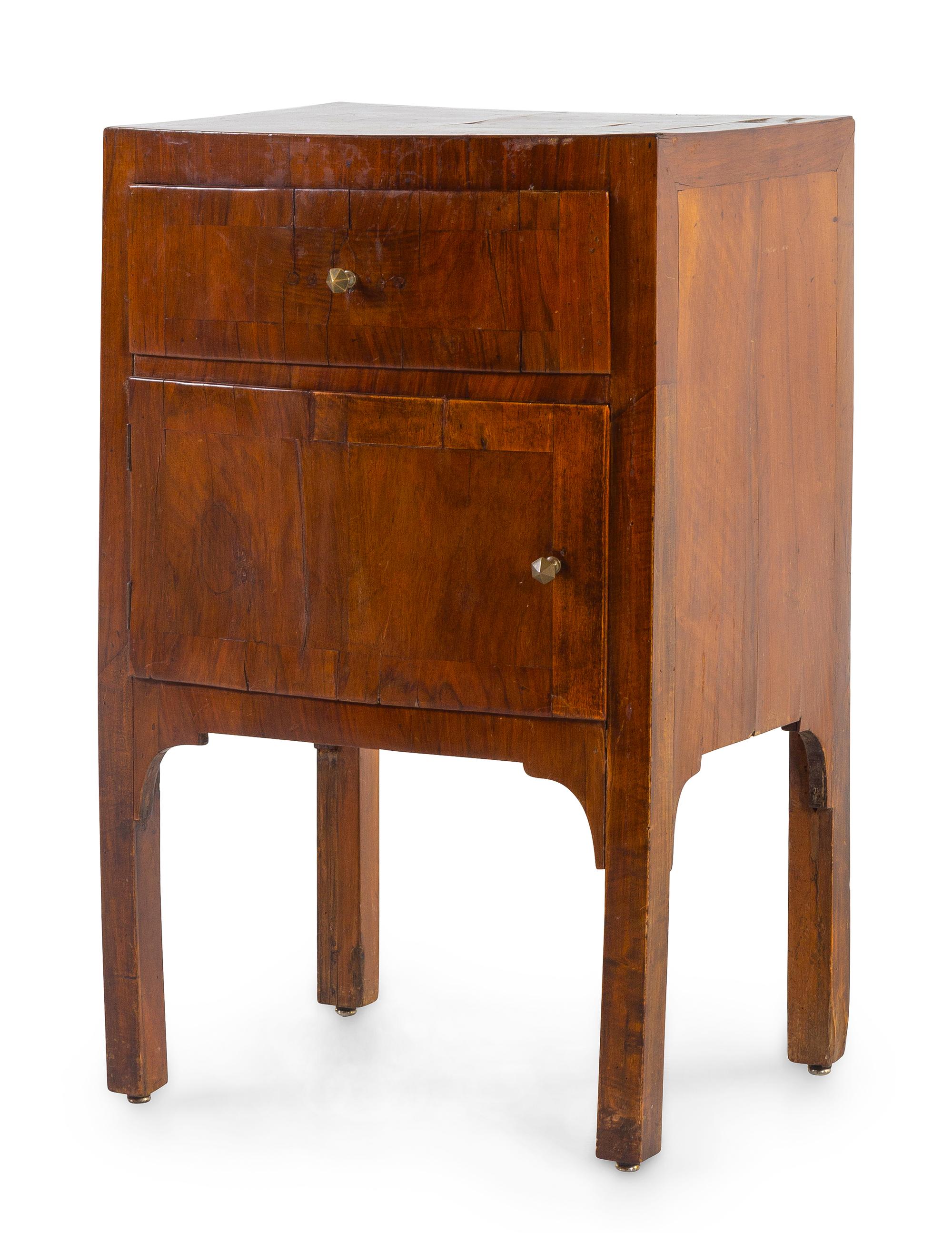 A Continental Fruitwood Veneered Commode
