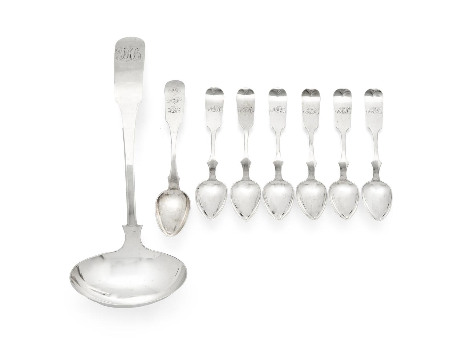 A Group of Eight Coin Silver Fiddle-Back Serving Articles