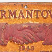 A painted cast iron fire mark for Germantown Mutual Fire Insurance Co. (chartered 1843) Philadelphia, PA, early 20th century