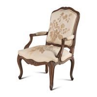 A Louis XV Style Carved Walnut Fauteuil