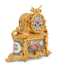 A French Gilt Bronze and Sèvres Style Porcelain Mantel Clock