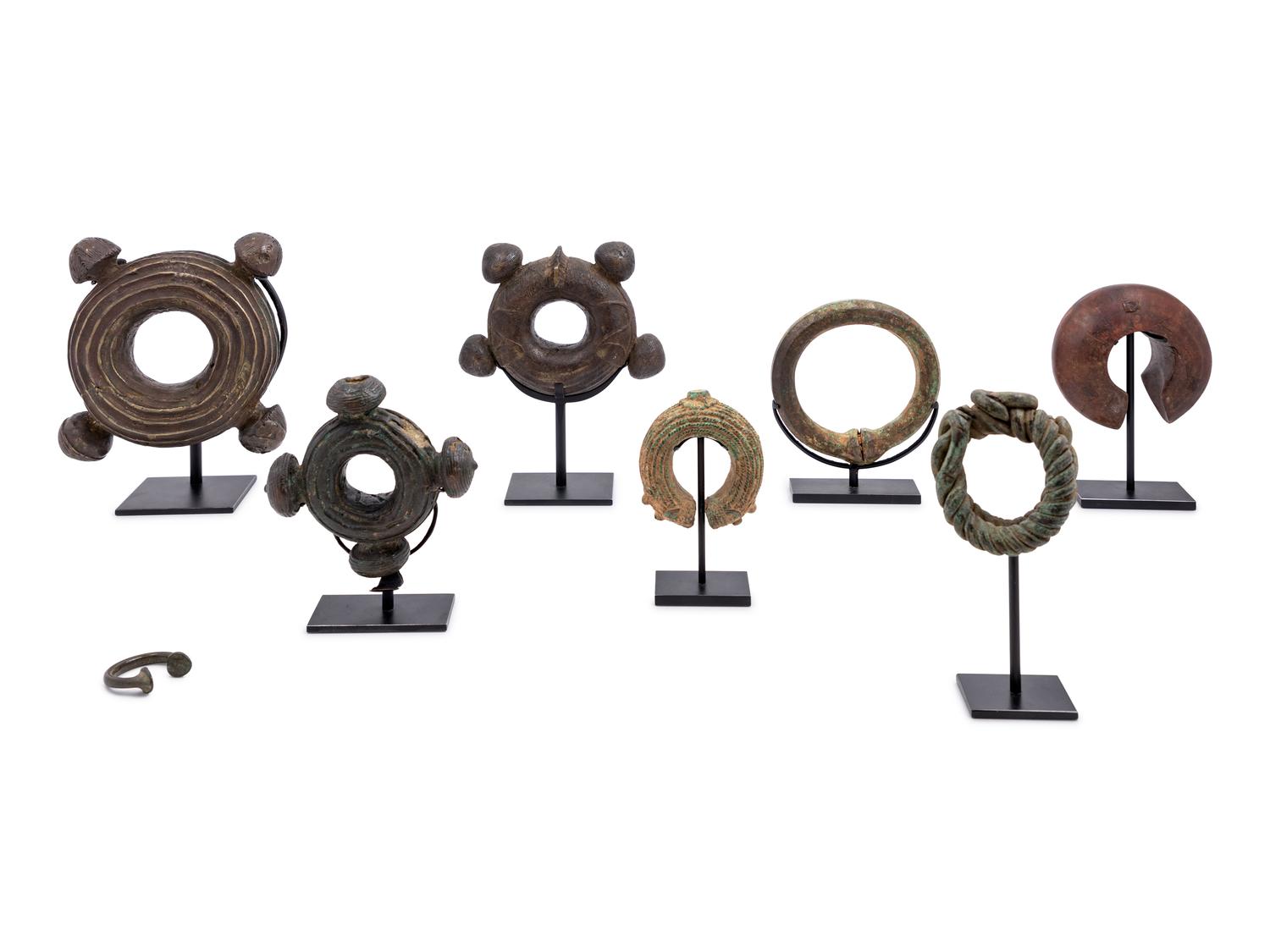 A Collection of African Bronze Currency Bracelets