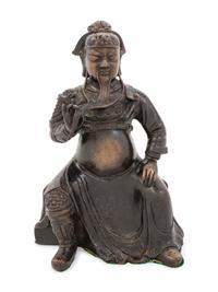 A Chinese Bronze Figure of a Seated Guardian, Guangong